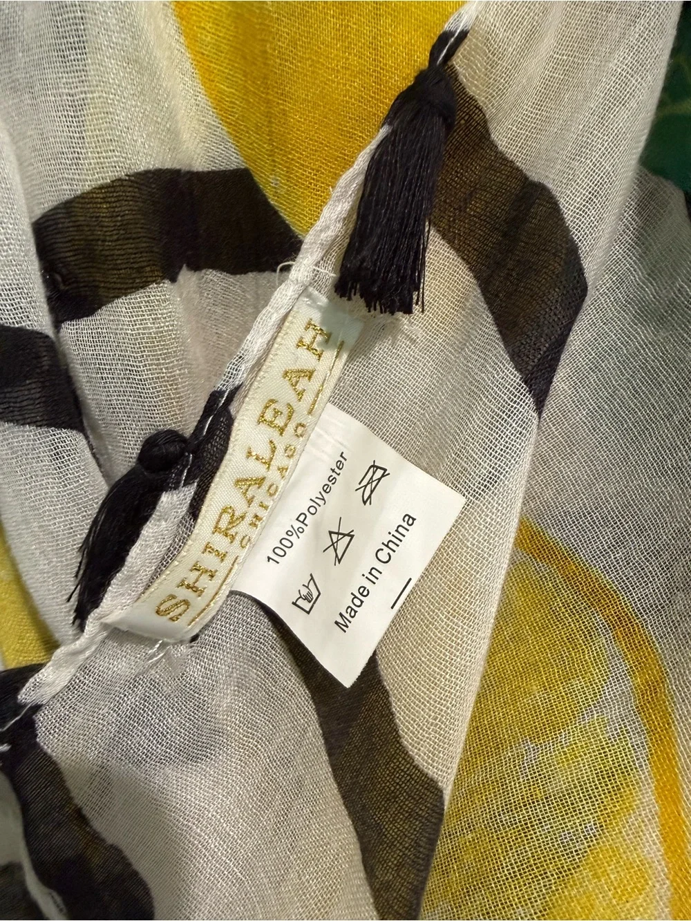 Shiraleah Lemon Print sheer scarf with trendy stripes and tassel trim